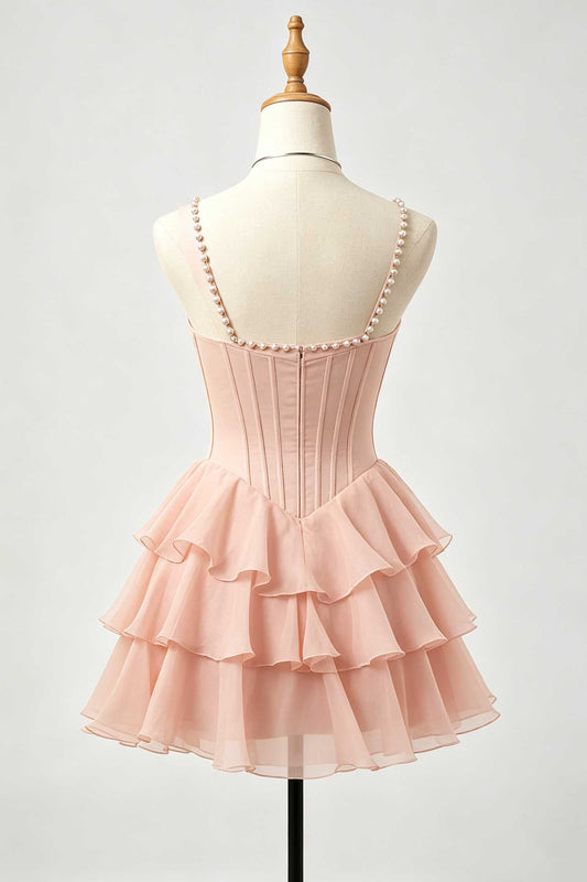 Back view of blush pink pearl square neck tiered homecoming dress