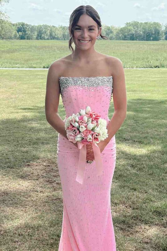 Close-up of rhinestone embellishments on blush pink strapless bodice