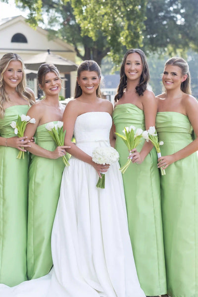 Bow back pleated strapless sheath bridesmaid dress