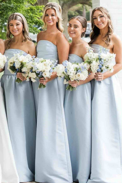 Side view of dusty blue A-line bridesmaid dress showing pleat detail