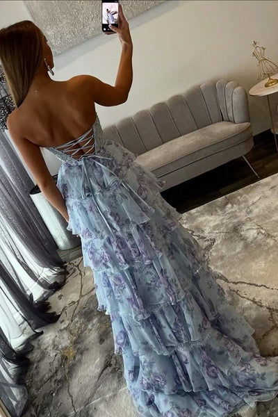 Light blue sweetheart tiered prom dress with waist bow