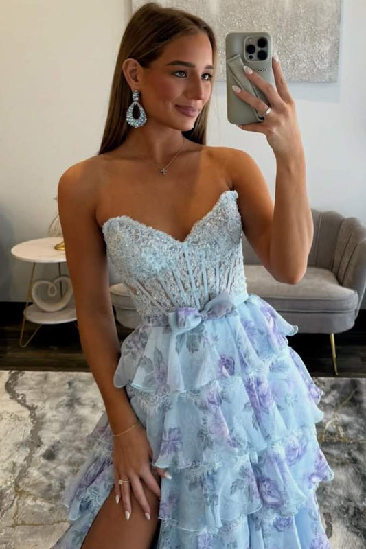 Close-up of waist bow and sweetheart neckline on light blue dress