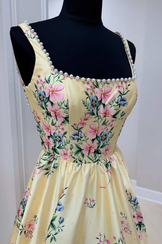 Close-up of pearl beading and square neckline detail