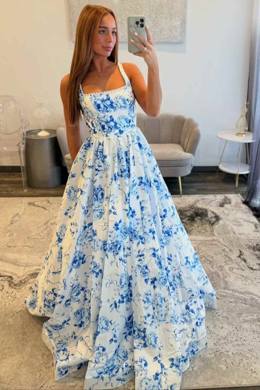Young woman wearing pearl square neck floral A-line prom dress