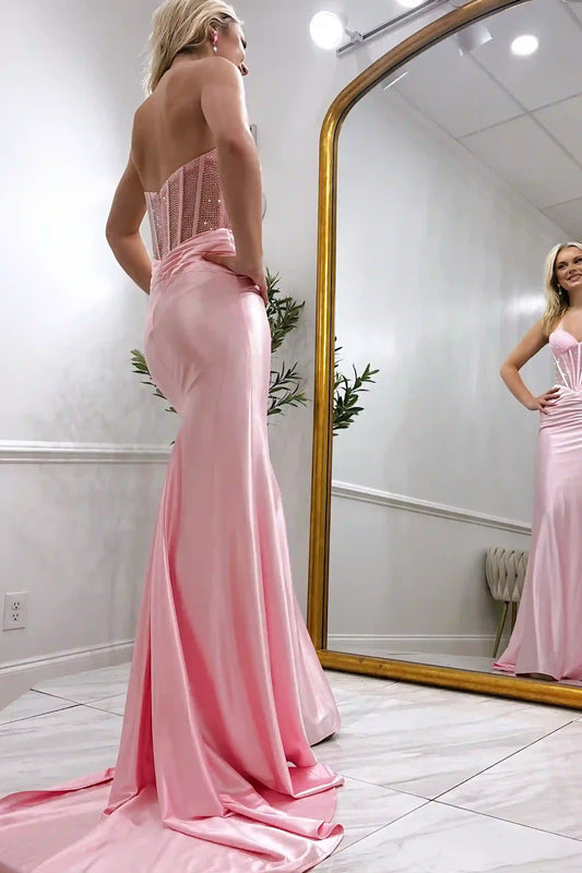 Back view of pink rhinestone sheer corset prom dress