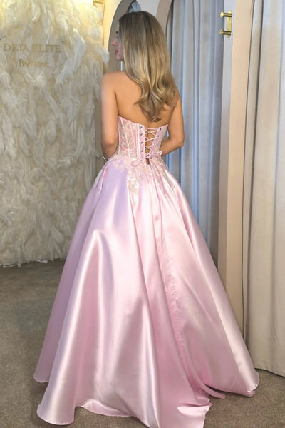Light pink satin strapless applique a line prom dress