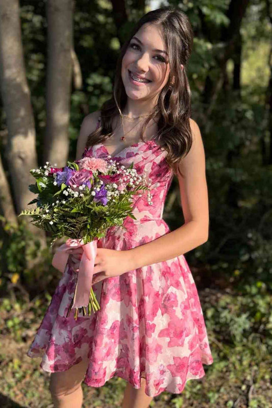 Woman wearing sheer pink rose floral mini party dress