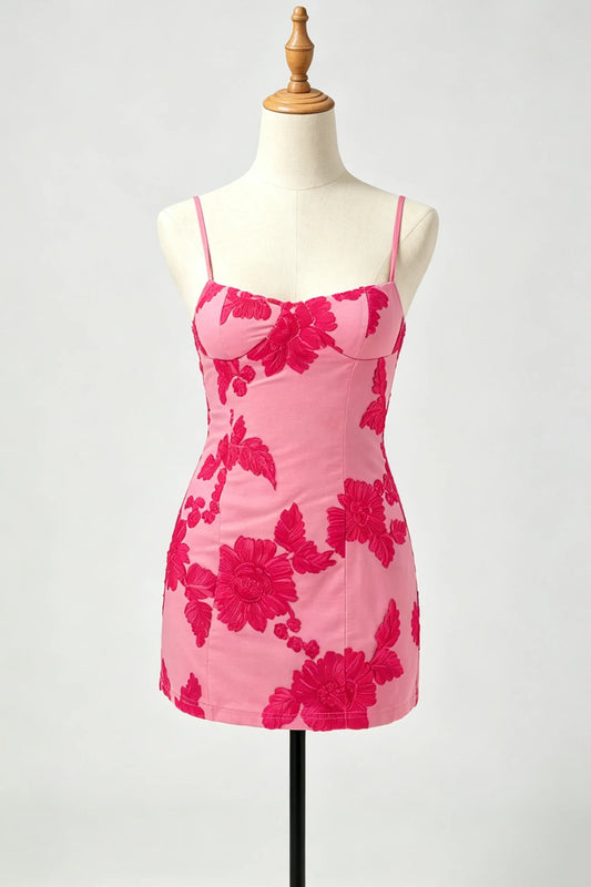 A pink homecoming dress with a bold dark pink floral pattern.