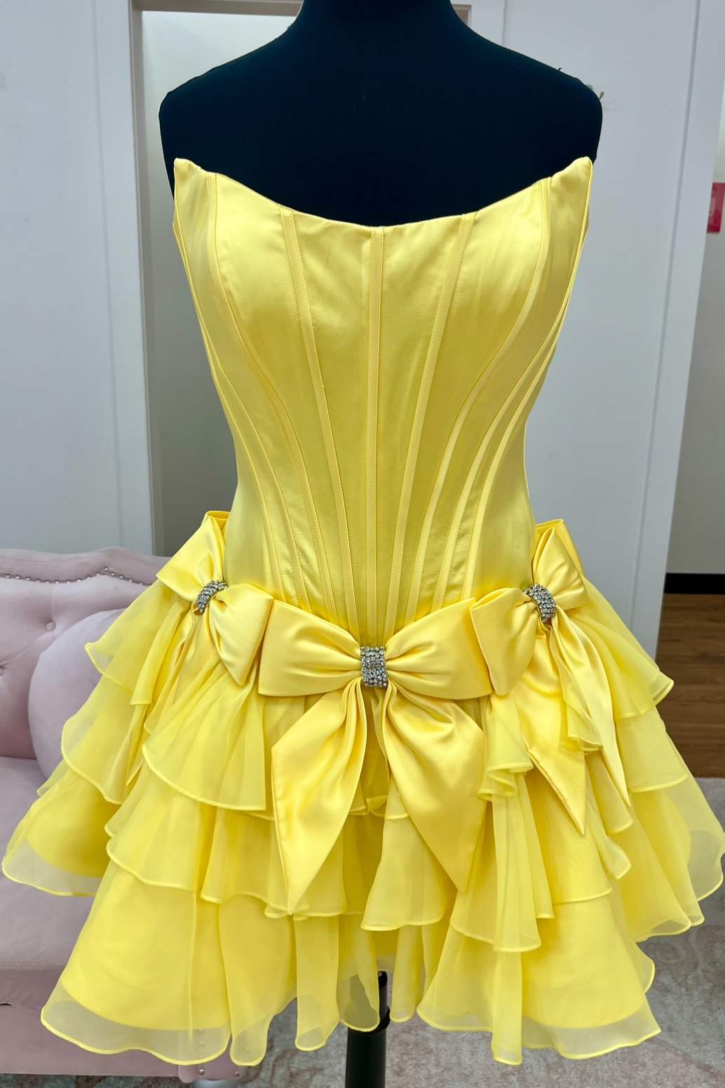 Strapless corset yellow satin homecoming dress with rhinestone embellishments