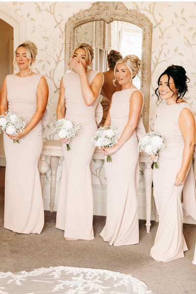 Yellow sleeveless open back bridesmaid dress with back bow